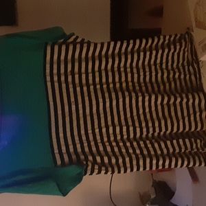 A black,white and blue cable and gauge tshirt